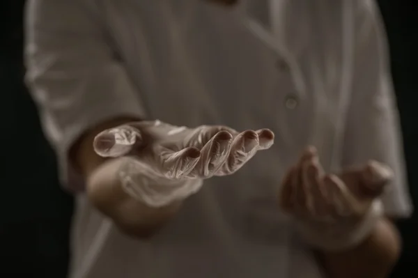 Female doctor holding something hands — Stock Photo, Image