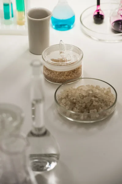 Test tubes, flask and glassware closeup — Stock Photo, Image