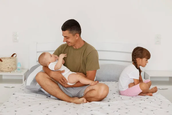 Indoor Shot Happy Father Holding Infant Baby Hands Sitting Offended — Stock Photo, Image
