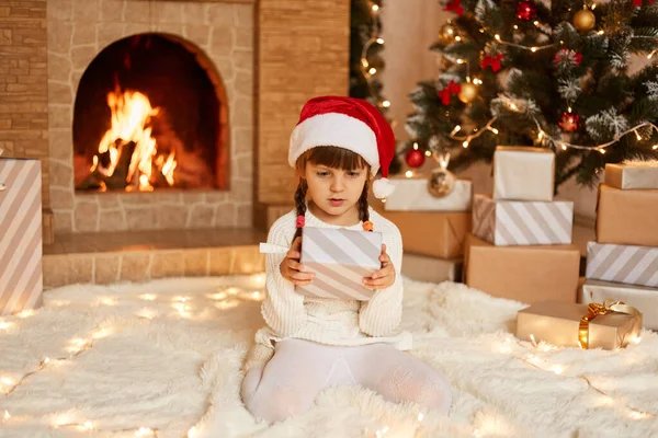 Cute Little Female Kid Wearing White Sweater Santa Claus Hat — Stock Photo, Image