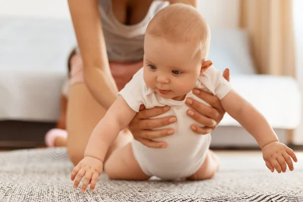 Adorable Cute Baby White Bodysuit Crawling Floor Carpet While Mother — Stock Photo, Image