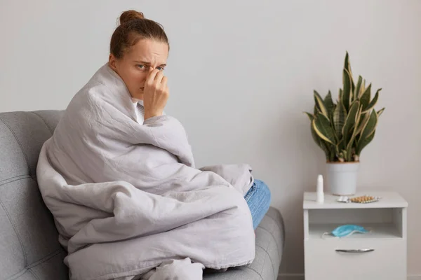 Sick Sad Woman Hair Bun Sitting Sofa Wrapped Blanket Fells — Stock Photo, Image