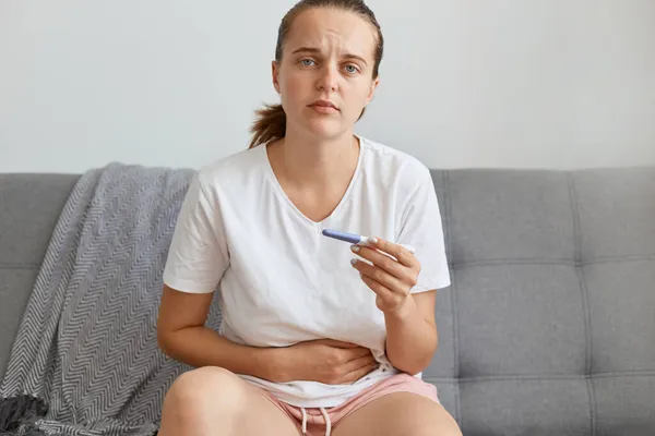 Indoor Shot Sad Young Adult Caucasian Woman Holding Pregnancy Test — Stock Photo, Image