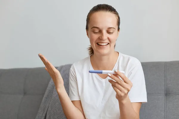 Excited Young Adult Female Pigtail Holding Positive Pregnancy Test Looking — Stock Photo, Image