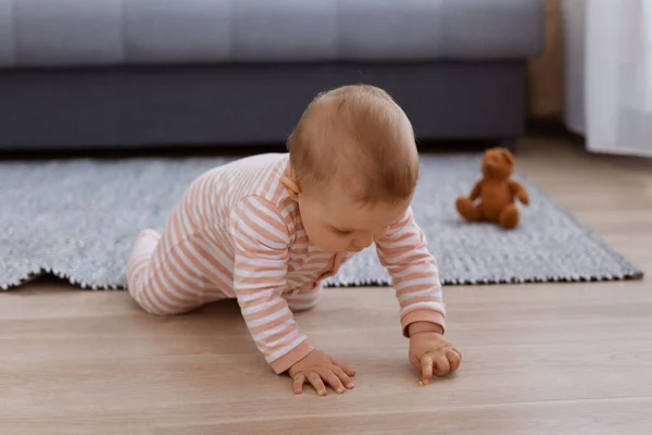 Indoor Shot Crawling Baby Girl Wearing Striped Sleeper Posing Floor — Stock Photo, Image