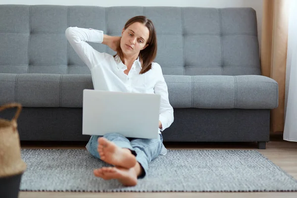 Portrait Tired Exhausted Woman Wearing White Shirt Jeans Sitting Floor — Stock Photo, Image