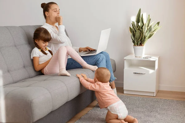 Indoor Shot Tired Sleepy Woman Wearing Shirt Jeans Sitting Sofa — Stock Photo, Image