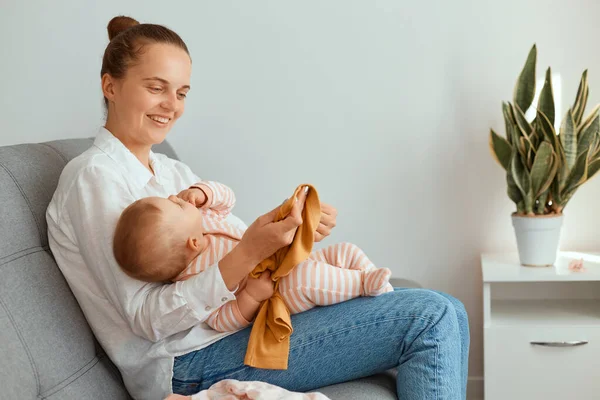 Horizontal Shot Attractive Young Adult Mother Sitting Sofa Her Toddler — Stock Photo, Image