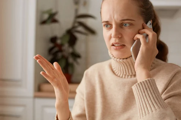 Portrait Confused Angry Woman Wearing Beige Casual Style Sweater Ponytail — Stock Photo, Image