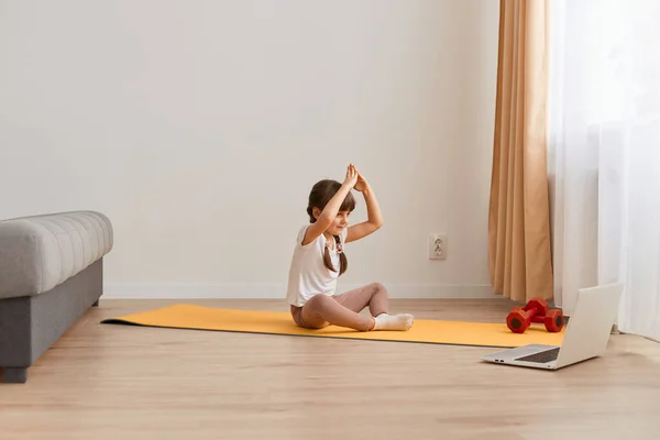 Indoor Shot Charming Dark Haired Girl Doing Yoga Exercise Sitting — Stock Photo, Image