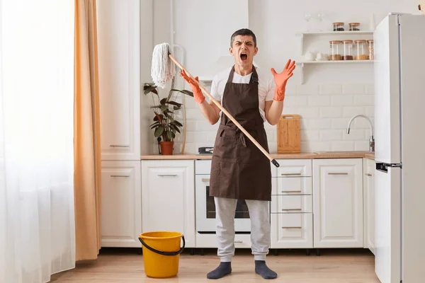 Indoor Shot Male Housekeeper Wearing White Shirt Brown Apron Standing —  Fotos de Stock