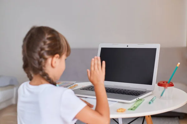 Back View Small Girl Doing Her Distance Education Hometask Waving — Stock Photo, Image