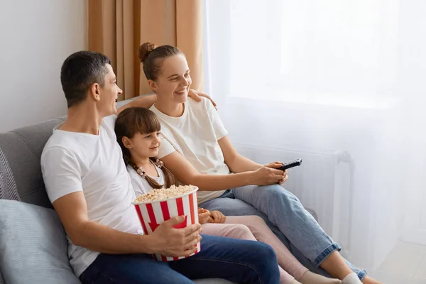 Indoor Shot Happy Family Wearing White Shirt Sitting Cough Watching — Stok fotoğraf