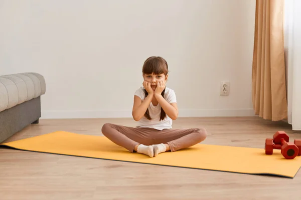 Portrait Bored Sad Little Girl Doing Exercises Yoga Fitness Mat — стоковое фото