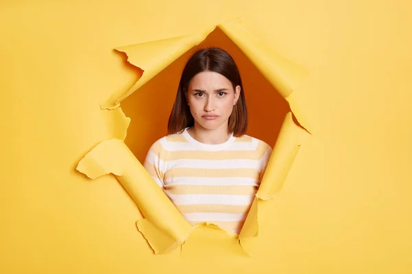 Indoor Shot Sad Upset Attractive Woman Stands Torn Paper Hole — Foto de Stock