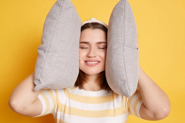 Indoor Shot Smiling Positive Woman Wearing Striped Shirt Holding Pillows — Stock Photo, Image