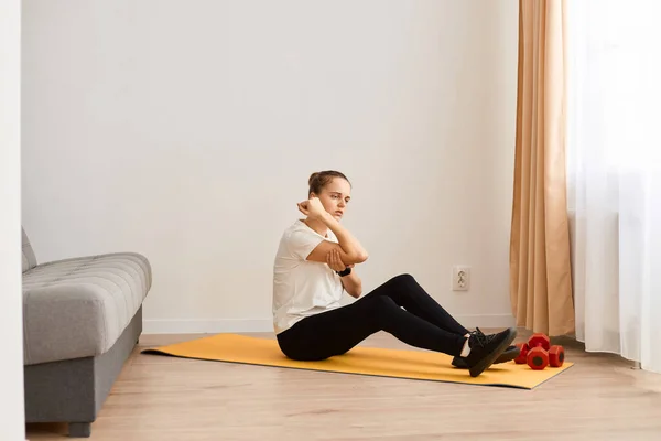 Side View Sick Woman Sitting Yoga Mat Feeling Elbow Pain — Stock Photo, Image