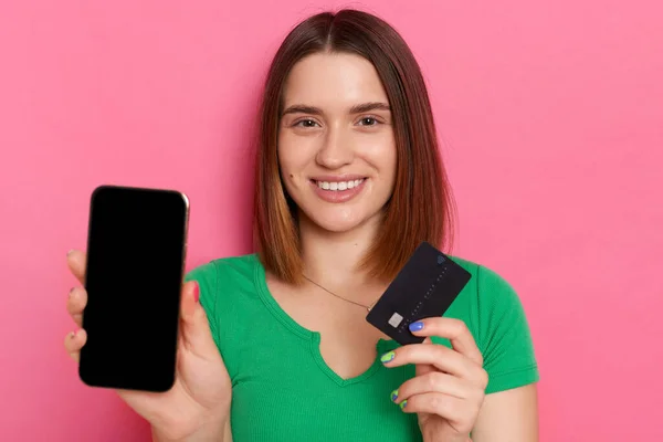Portrait Smiling Optimistic Dark Haired Woman Holding Credit Card Cell — Stok Foto