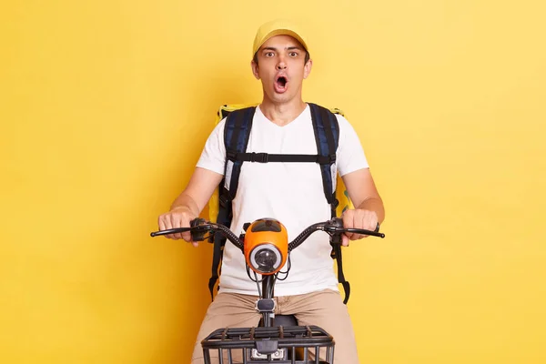 Horizontal Shot Shocked Surprised Courier Guy Riding Bike Backpack Bag — Stock fotografie