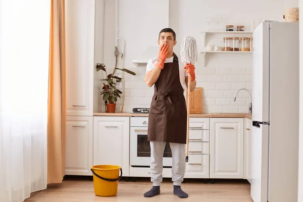 Indoor Full Length Portrait Shocked Man Housekeeper Standing Mop Hands — Foto de Stock