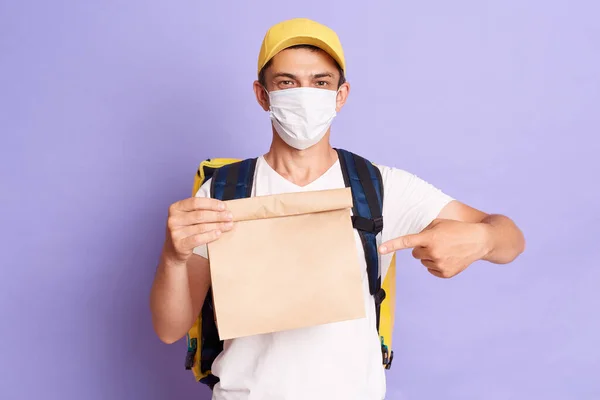 Courier Man White Shirt Cap Protective Mask Pointing Finger Paper — Photo