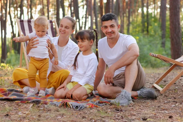 Beautiful Happy Family Enjoying Moment While Sitting Blanket Forest Playing — Stok Foto