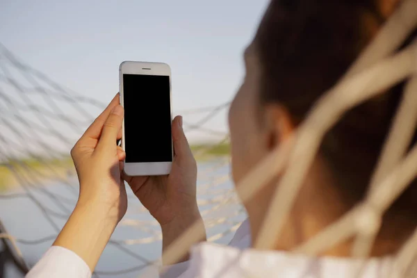 Closeup Dark Haired Woman Lying Hammock Using Social App Mobile — Stock Fotó