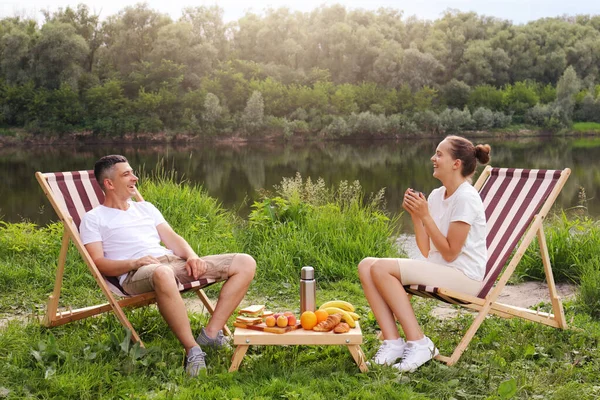 Image Happy Delighted Man Woman Sitting Deck Chair Drinking Coffee — Foto Stock