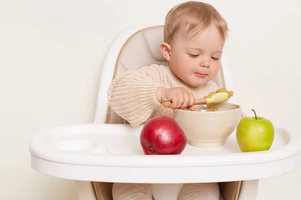Portrait Little Cute Charming Baby Eating Food Plate Spoon While — Fotografia de Stock