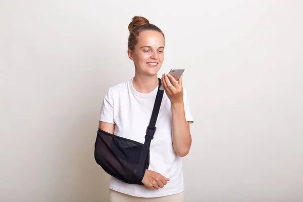 Indoor Shot Delighted Woman Bun Hairstyle Wearing Casual Shirt Posing — Foto de Stock