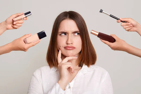 Photo Hands Several Beauticians Holding Respective Equipment Giving Makeup Attractive — Stockfoto