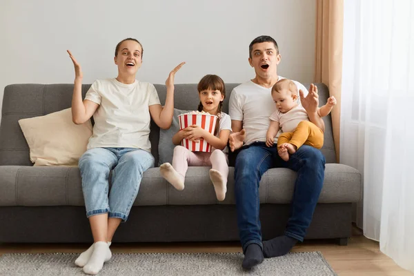 Excited Woman Man Wearing Casual White Shirts Sitting Sofa Children — Stock Photo, Image