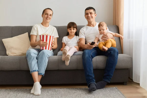Indoor Shot Happy Positive Family Wearing Casual White Shirts Sitting — Stock Photo, Image