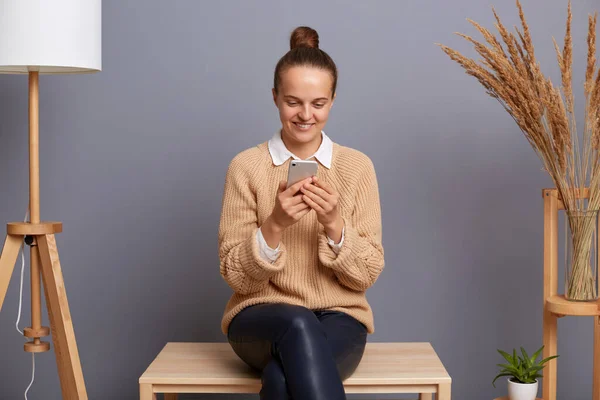 Portrait Good Looking Woman Wearing Beige Jumper Sitting Chair Using — Stock Photo, Image