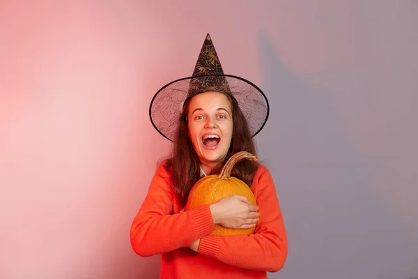 Indoor Shot Excited Amazed Caucasian Woman Dressed Witch Hat Holding —  Fotos de Stock