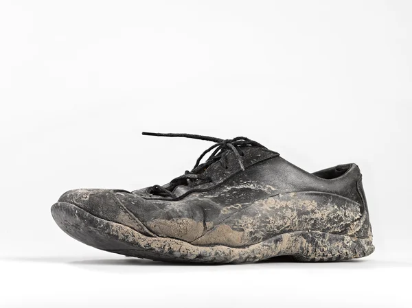 Muddy and dirty shoe — Stock Photo, Image