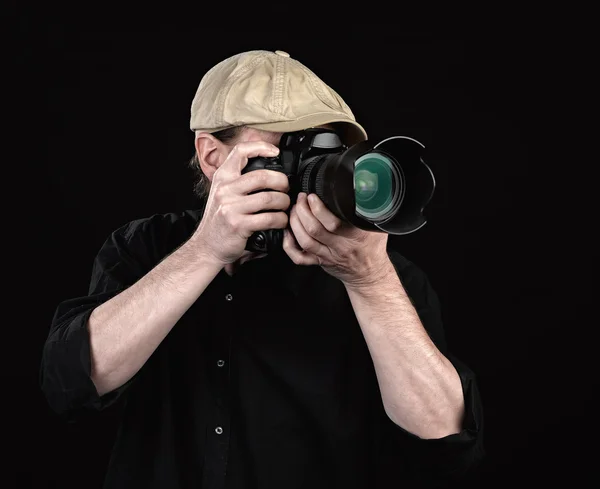 Ein Fotograf mit einer schönen Kamera. — Stockfoto