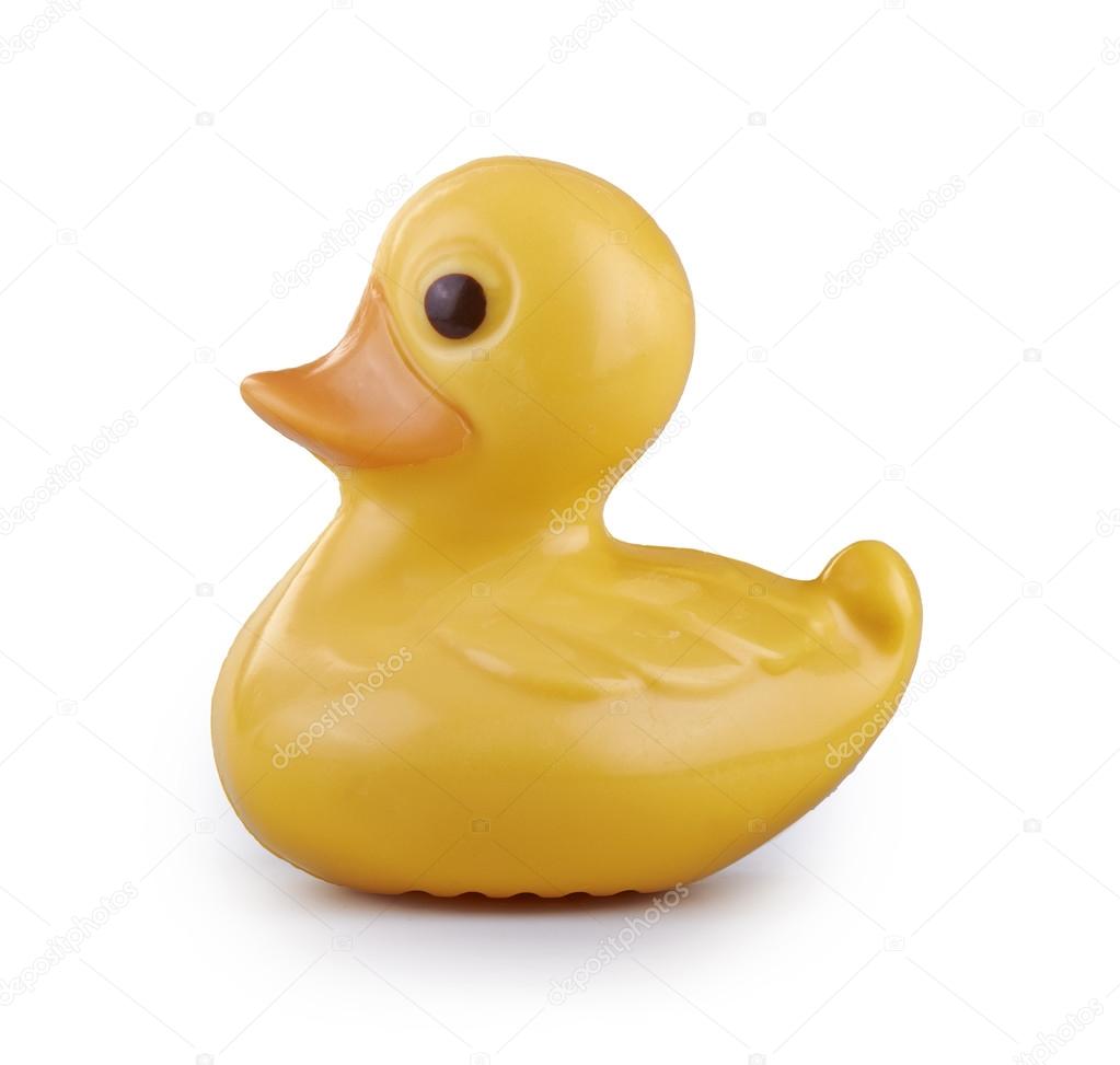 Cute yellow chocolate duck isolated over white background