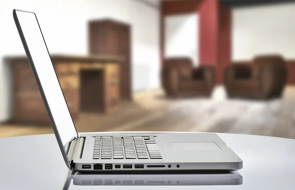 Laptop with man hand in loft studio — Stock Photo, Image