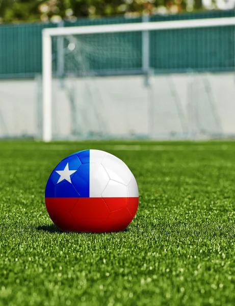 Soccer Ball with Chile Flag on the grass in stadium — Stock Photo, Image