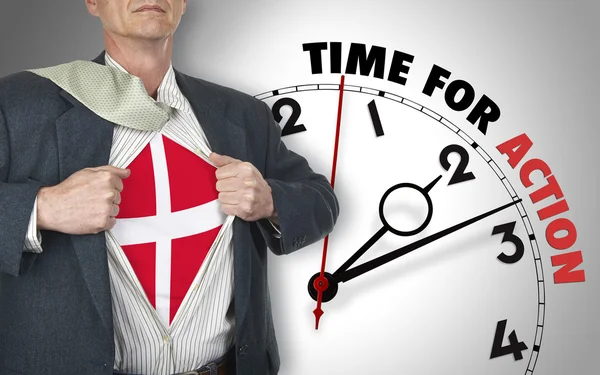 Businessman showing shirt with flag from Denmark suit against cl — Stock Photo, Image