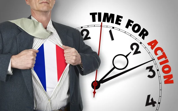 Businessman showing shirt with flag from French suit against clo — Stock Photo, Image