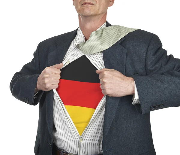 Επιχειρηματίας δείχνει Γερμανία κοστούμι superhero σημαία κάτω από του s — Φωτογραφία Αρχείου