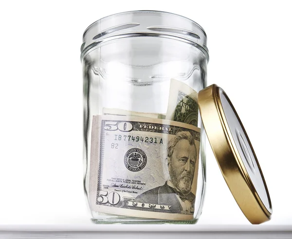 US dollars bank notes in a glass opened jar — Stock Photo, Image