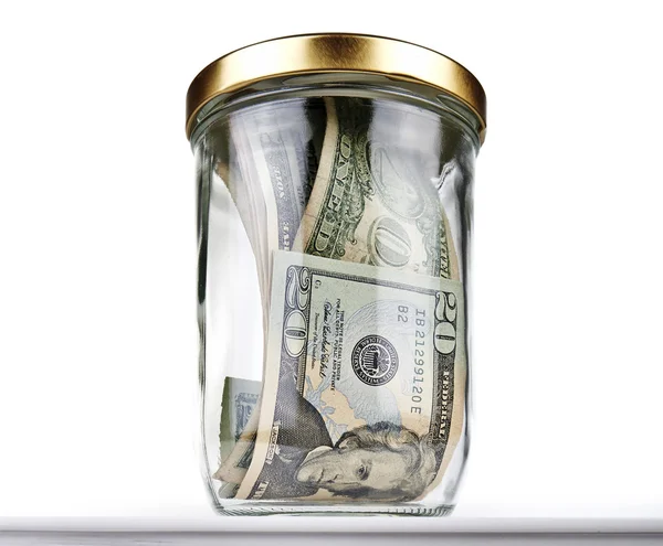 Ons dollar biljetten in een glazen pot gesloten — Stockfoto