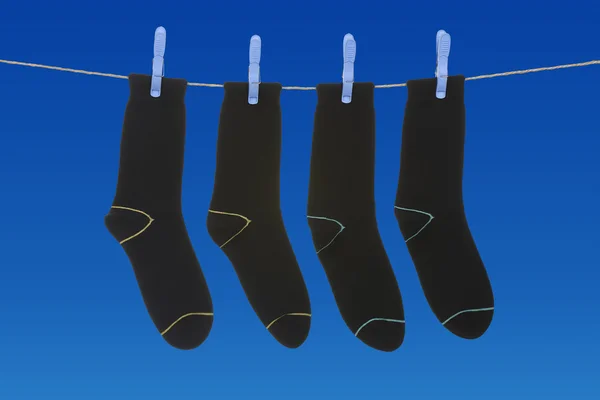 Socken zum Trocknen hängen — Stockfoto