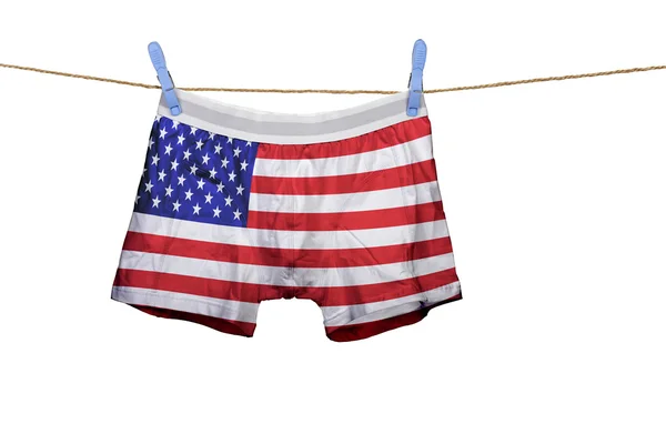 Roupa interior com a bandeira dos EUA em uma corda — Fotografia de Stock