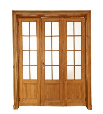 Interior Aged wooden door iwith glasses frames isolated