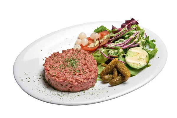White plate with American beef Tartar.  Isolated with clipping path