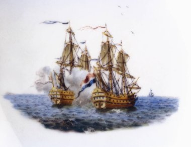 Brussels, Belgium - August 09, 2022:  Central motif of a Tournai porcelain saucer decorated with a naval combat scene